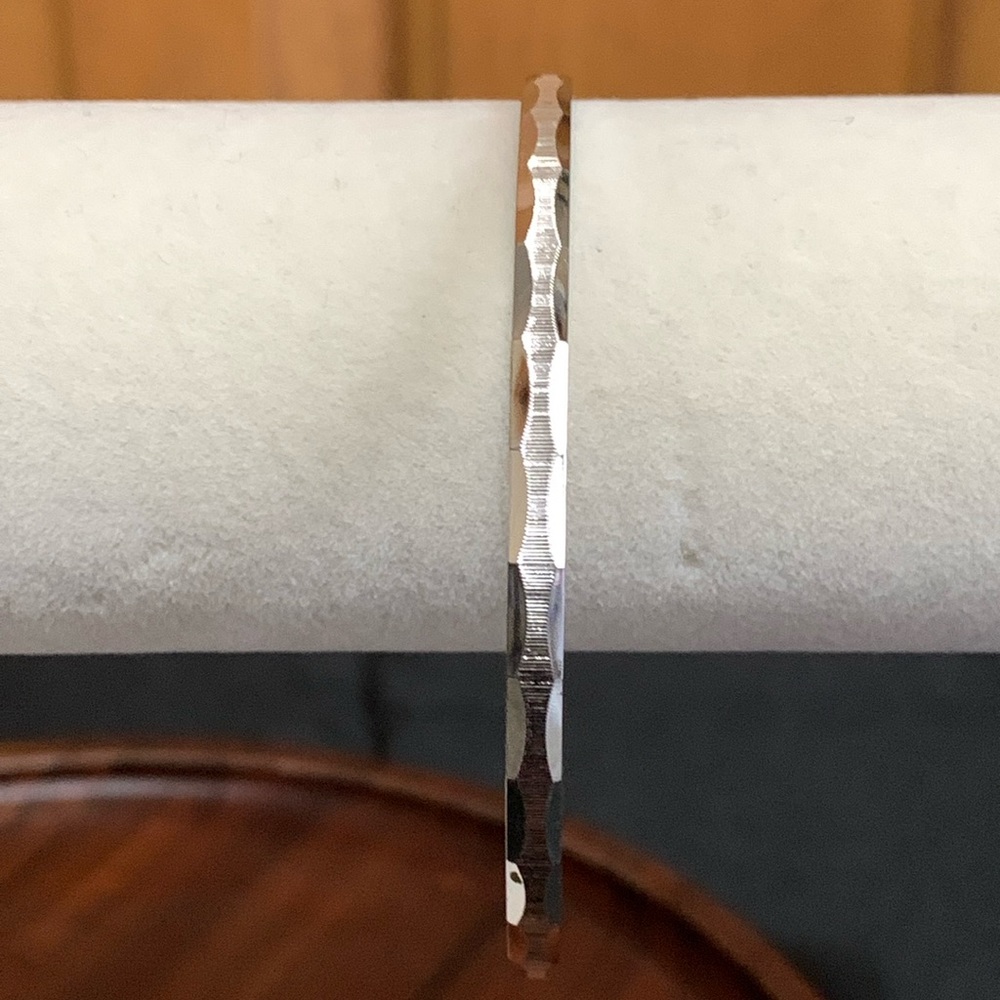 Monet silver tone etched bracelet